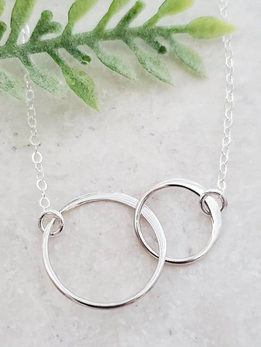 Two Intertwined Circle Sideways Necklace